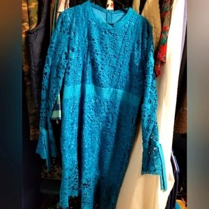 Fully lined crochet style dress.